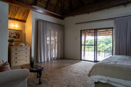 Guest suite with a private deck overlooking the bush at Tolile Lodge